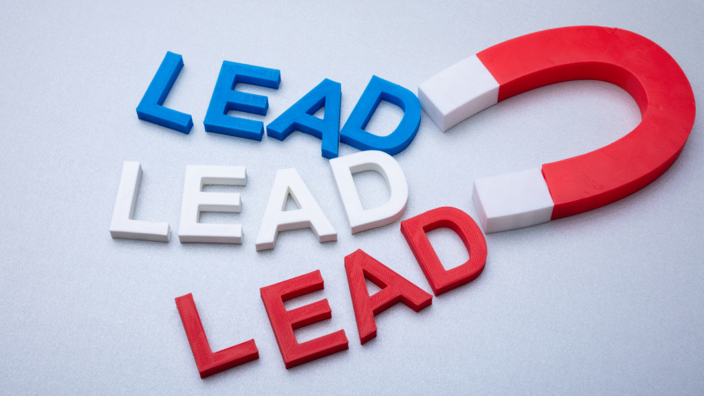 A large red and white horseshoe magnet attracting the word "LEAD," symbolizing a successful lead generation strategy for a local business website.